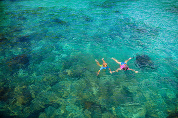 Kids snorkel. Children snorkeling in tropical sea.