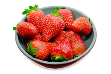 Bowl of ripe fresh strawberries on white background, isolated