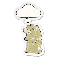 cute cartoon bear and thought bubble as a distressed worn sticker
