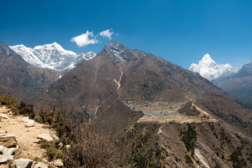 Village in Himalayas with Ama Dblam and Tobuche