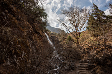 Scenic landscape with waterfall in low Himalayas
