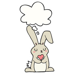 cartoon rabbit in love and thought bubble