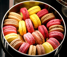 Delicious macaroni cookies in a box photographed