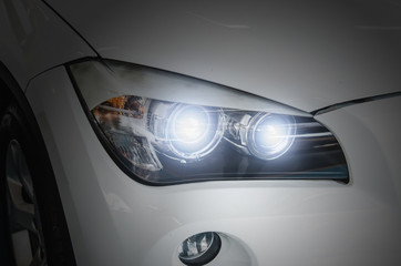 Obraz na płótnie Canvas Modern car headlights