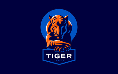 A tiger lies with its head down