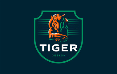 A tiger lies with its head down