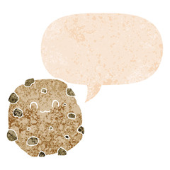 cartoon biscuit and speech bubble in retro textured style