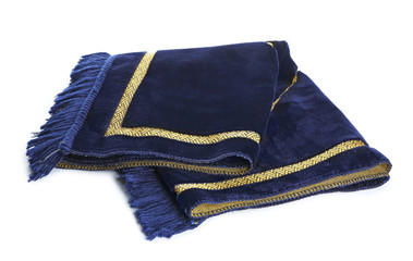 Muslim prayer mat on white background