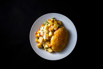 Chicken kiev, potato and vegetable