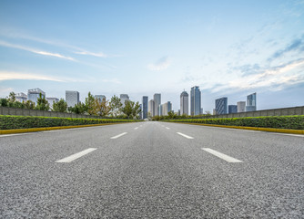 Fototapeta premium city road through modern buildings in beijing.