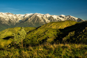 Fototapeta premium A Stunning sunrise in the mountains. Beautiful spring landscape. Zangezur Mountains. Armenia