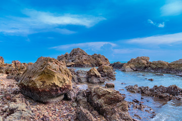 Fresh air at the sea Beautiful stones being beaten by waves.