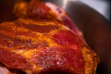 Raw meat for barbeque in a metal pan close up. Selective focus