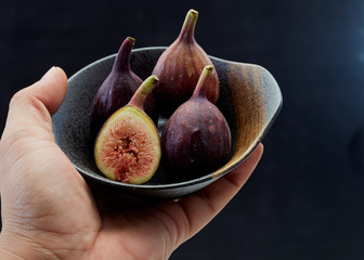 Holding plate with cut ripe figs