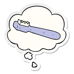 cartoon toothbrush and thought bubble as a printed sticker