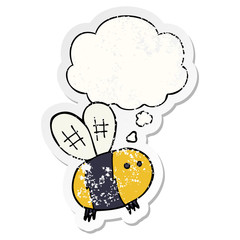 cartoon bee and thought bubble as a distressed worn sticker