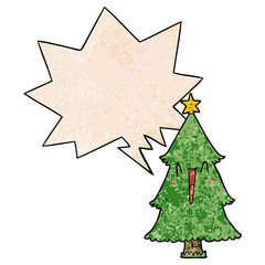cartoon christmas tree and speech bubble in retro texture style