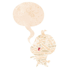 cartoon halloween mummy and speech bubble in retro textured style
