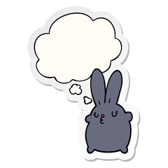 cute cartoon rabbit and thought bubble as a printed sticker
