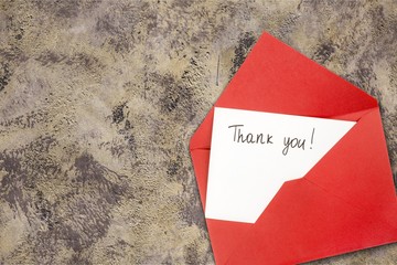 Blank card and envelope with thank you on background