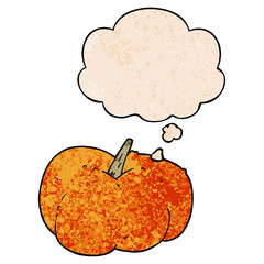 cartoon pumpkin squash and thought bubble in grunge texture pattern style