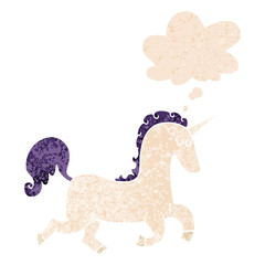 cartoon unicorn and thought bubble in retro textured style