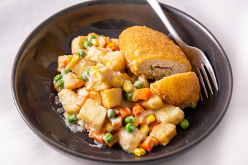Chicken kiev, potato and vegetable