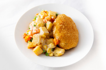 Chicken kiev, potato and vegetable