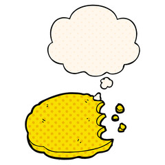 cartoon cookie and thought bubble in comic book style