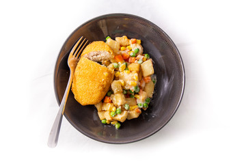 Chicken kiev, potato and vegetable