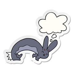 funny cartoon rabbit and thought bubble as a printed sticker