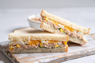 Tuna fish sandwich with egg and corn