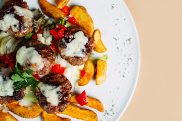 Meat balls with sauce and potatoes