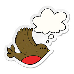 cartoon flying bird and thought bubble as a printed sticker