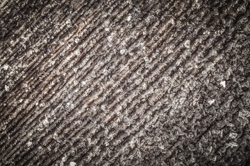 Frost on a old wooden surface. Winter morning dew and freezing. Toned