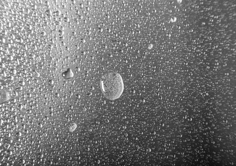 Drops of water in a metal sink on a modern kitchen