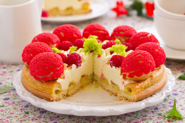 Author Cake "Saint Honore" with raspberries.