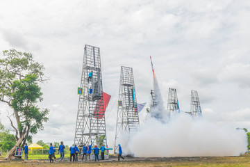 Many people are preparing fireballs, the rocket taking off to the sky, Thailand community rocket festival at Phanom Phrai District, Roi Et Province.