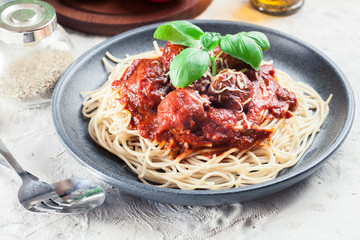 Spaghetti pasta with meatballs and tomato sauce