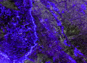 Colorful abstract background. Macro texture of stones. Surface of amethyst. Purple  color. Modern poster, print, web design. Creative and unusual backdrop. Image.Gemstone