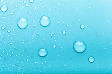 Drops of water on a color background. Blue. Toned - 276274961