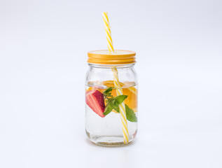 Fruit infused water in a jar