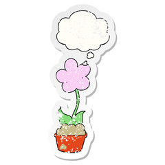 cute cartoon flower and thought bubble as a distressed worn sticker