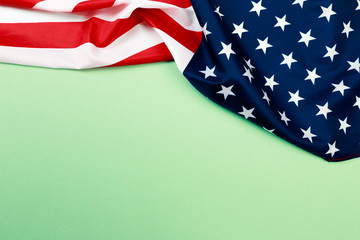 American flag on green  background  top view