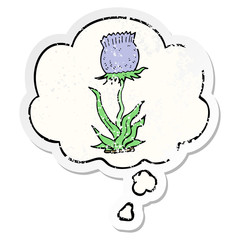 cartoon wild flower and thought bubble as a distressed worn sticker
