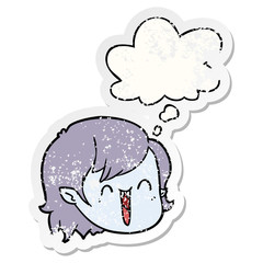 cartoon vampire girl face and thought bubble as a distressed worn sticker