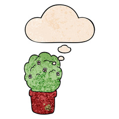 cartoon shrub and thought bubble in grunge texture pattern style