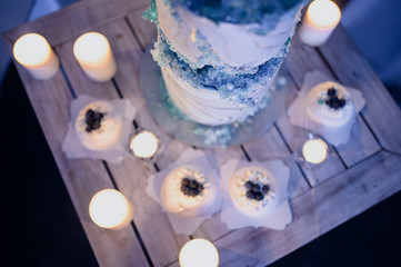 Big wedding cake close-up on the wedding table close up