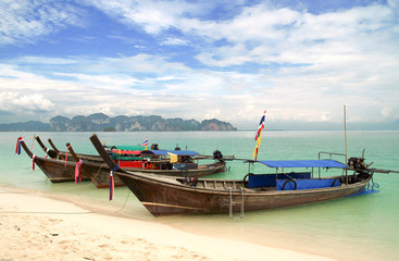 Fototapeta na wymiar Long tail boats on the beach