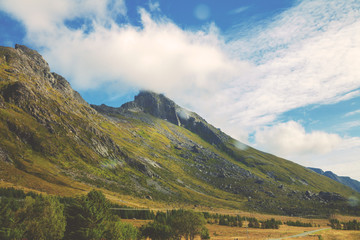 Fototapeta premium Beautiful mountains against cloudy sky. Nature of Norway